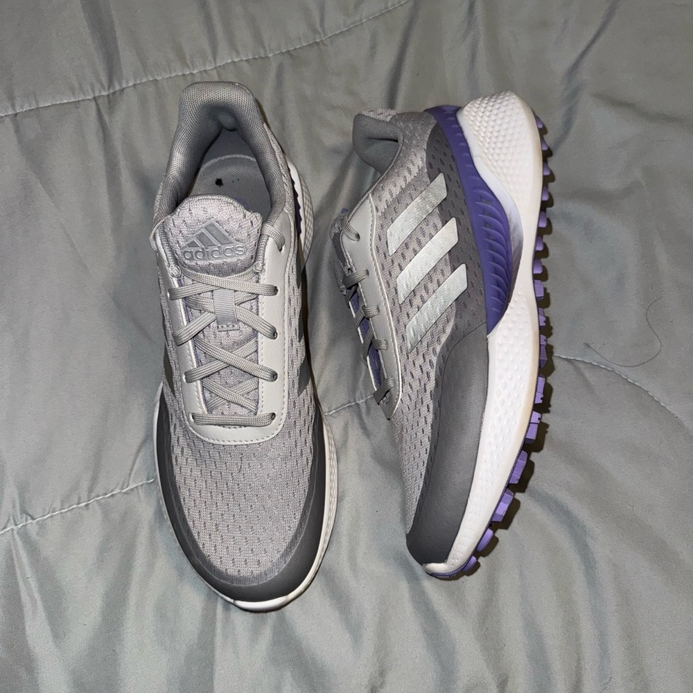 Adidas Gray and Purple Athletic Shoes with Boost Cushioning